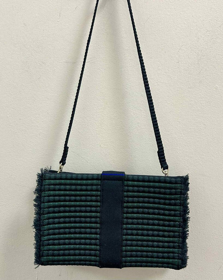 Rothy’s Navy Blue Tassel Clutch (Retails for $100)