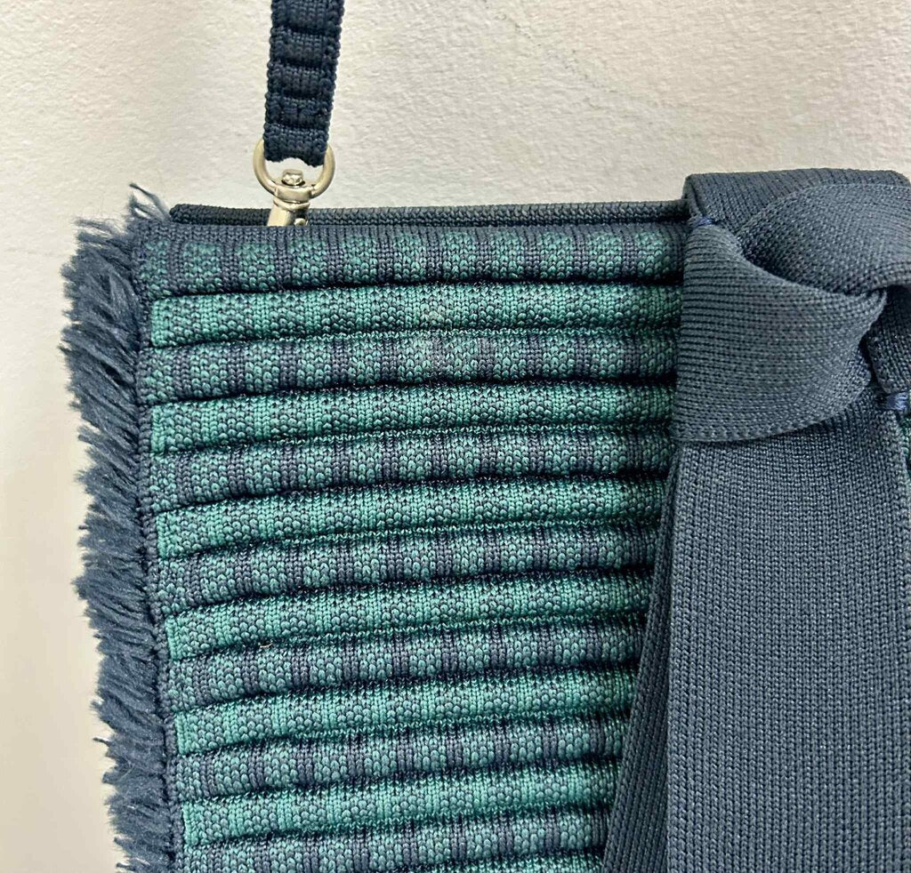 Rothy’s Navy Blue Tassel Clutch (Retails for $100)