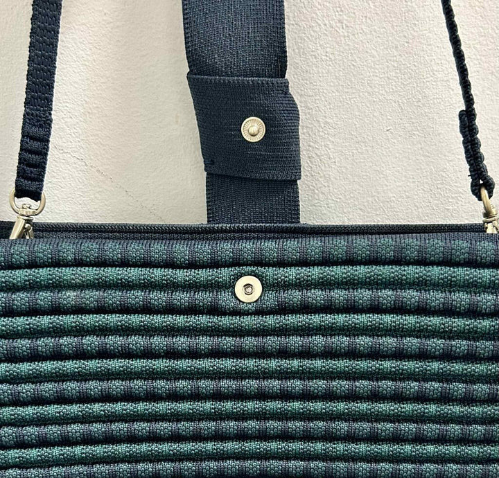 Rothy’s Navy Blue Tassel Clutch (Retails for $100)