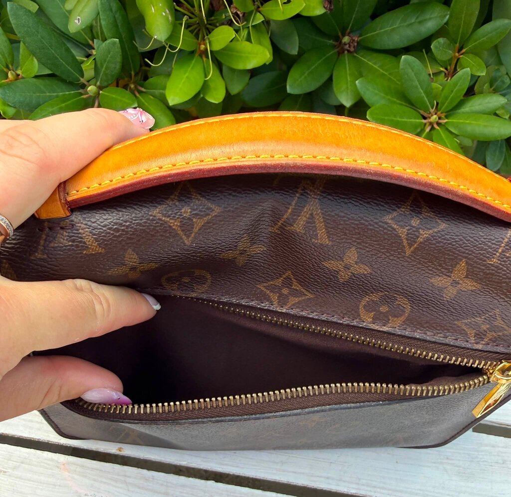 Louis Vuitton Monogram Pochette Metis (Retails for $2,840)