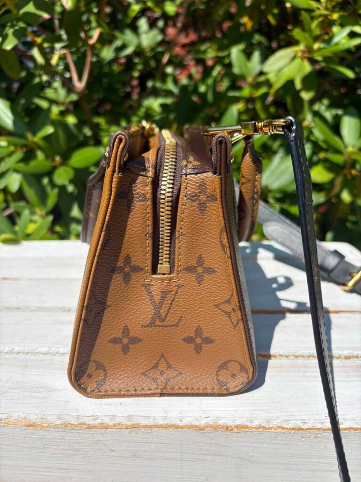 Louis Vuitton On The Go East West (Retails for $3,150)