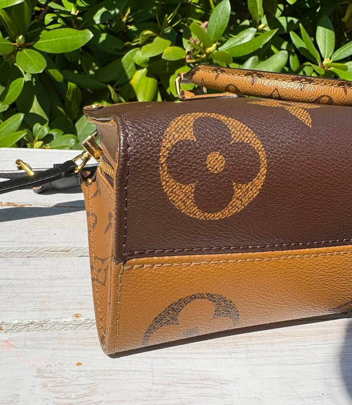 Louis Vuitton On The Go East West (Retails for $3,150)