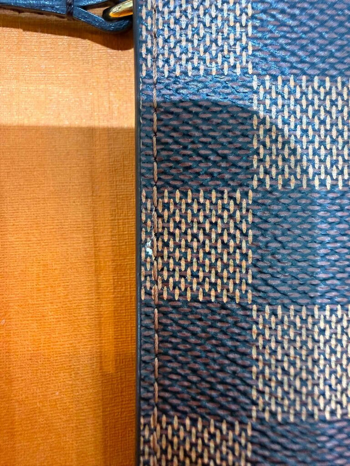 Louis Vuitton Damier Ebene Neverfull Wristlet